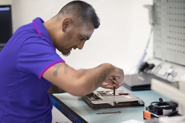 Repairs taking place in Curry's electronics repair centre. Image courtesy of Currys