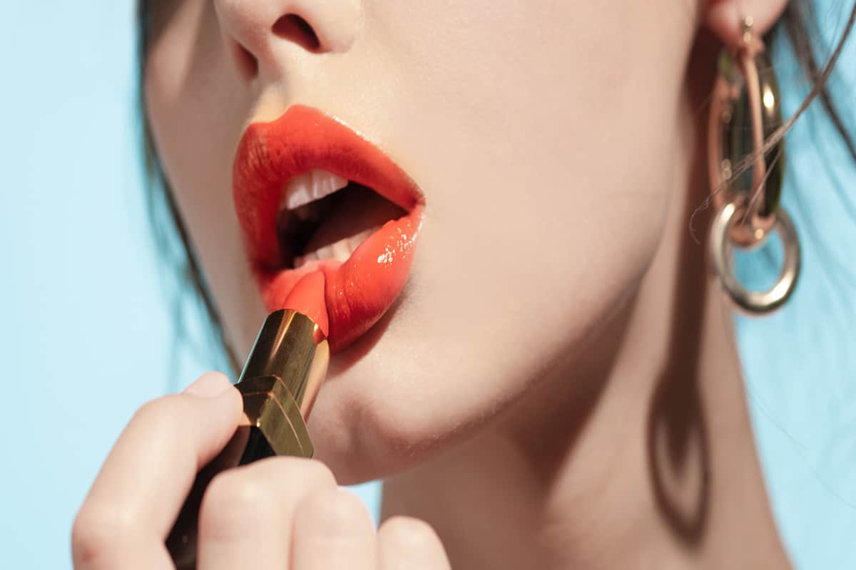 The 'lipstick index' theory suggests that small treats matter in times of recession. Image: Adobe Stock